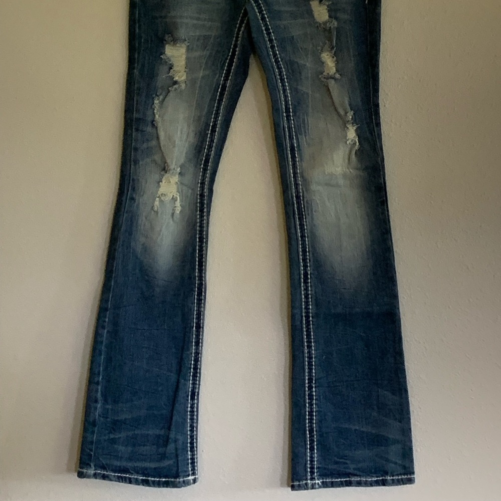 Amethyst distressed Jeans NWOT.